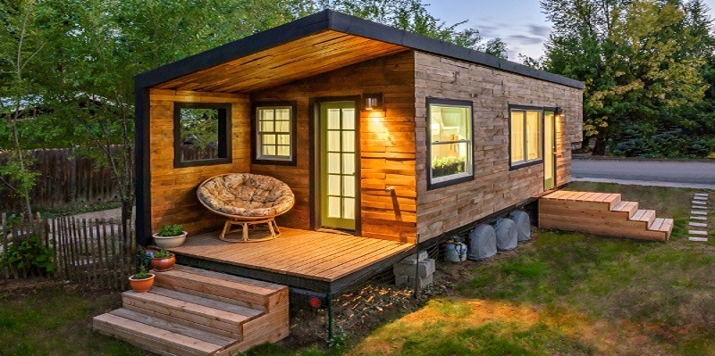 Are wooden houses cheaper compared to houses from other materials?